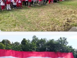 Menyambut Kemerdekaan RI dengan Jalan Sehat Bentangkan Bendera Merah Putih di Desa Wisata Pulau Maitara Kota Tidore Kepulauan